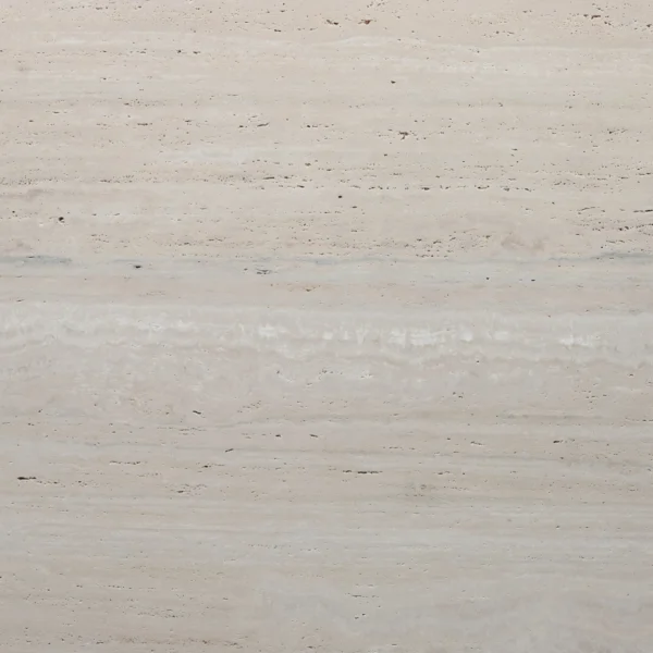 Close-up of a light beige, textured concrete wall with horizontal lines and small holes.